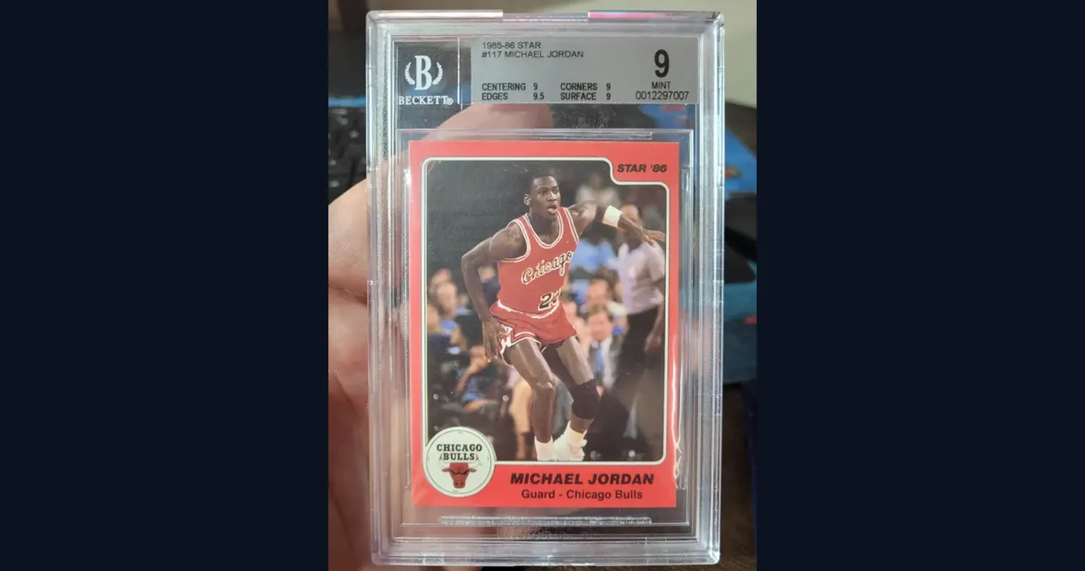 A 1985-86 Star #117 Michael Jordan card in a Beckett 9 Mint slab, with subgrades of 9 centering, 9 corners, 9.5 edges and 9 surface