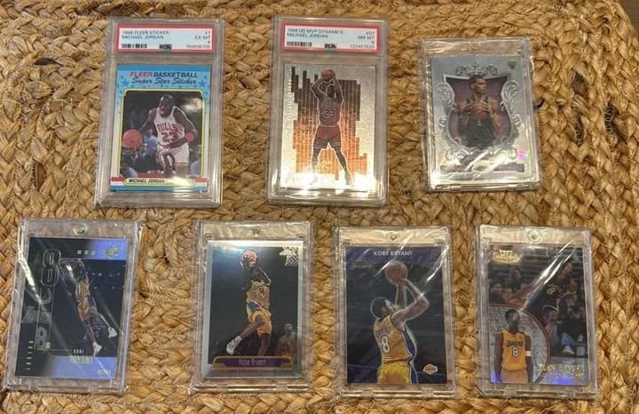 Michael Jordan graded cards and Kobe Bryant cards in protective holders