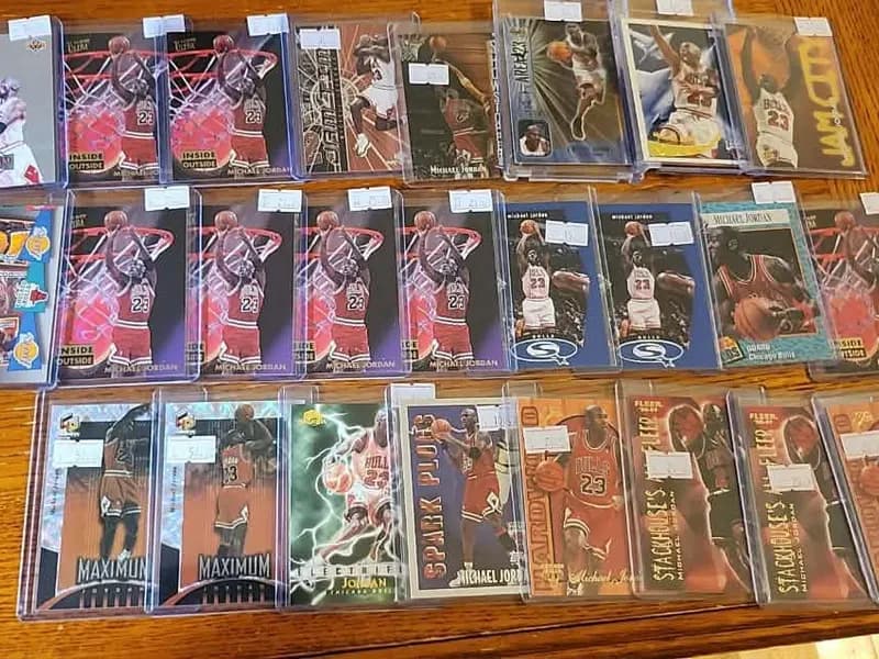 A group of Michael Jordan basketball cards in protective holders